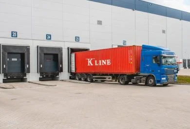 Loading Used Clothing Bales Into Container For Export